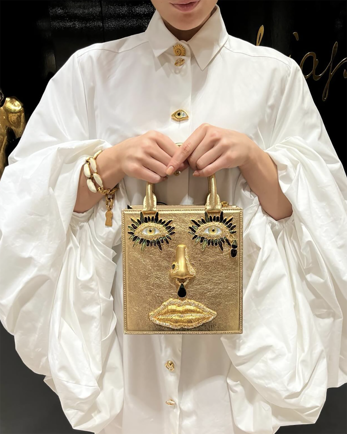 Face bag jewelry hardware — Schiaparelli, designed by Elsa Sen